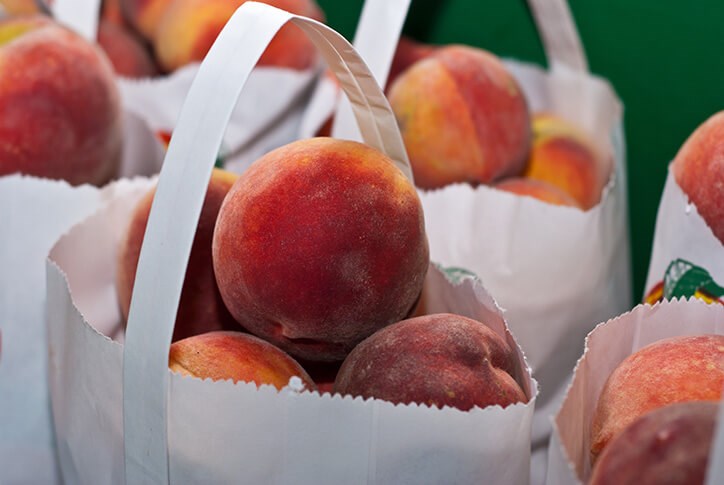 Bags of fresh Georgia peaches.