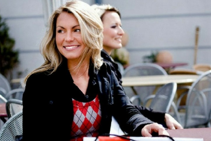 Woman taking a coffee break while shopping