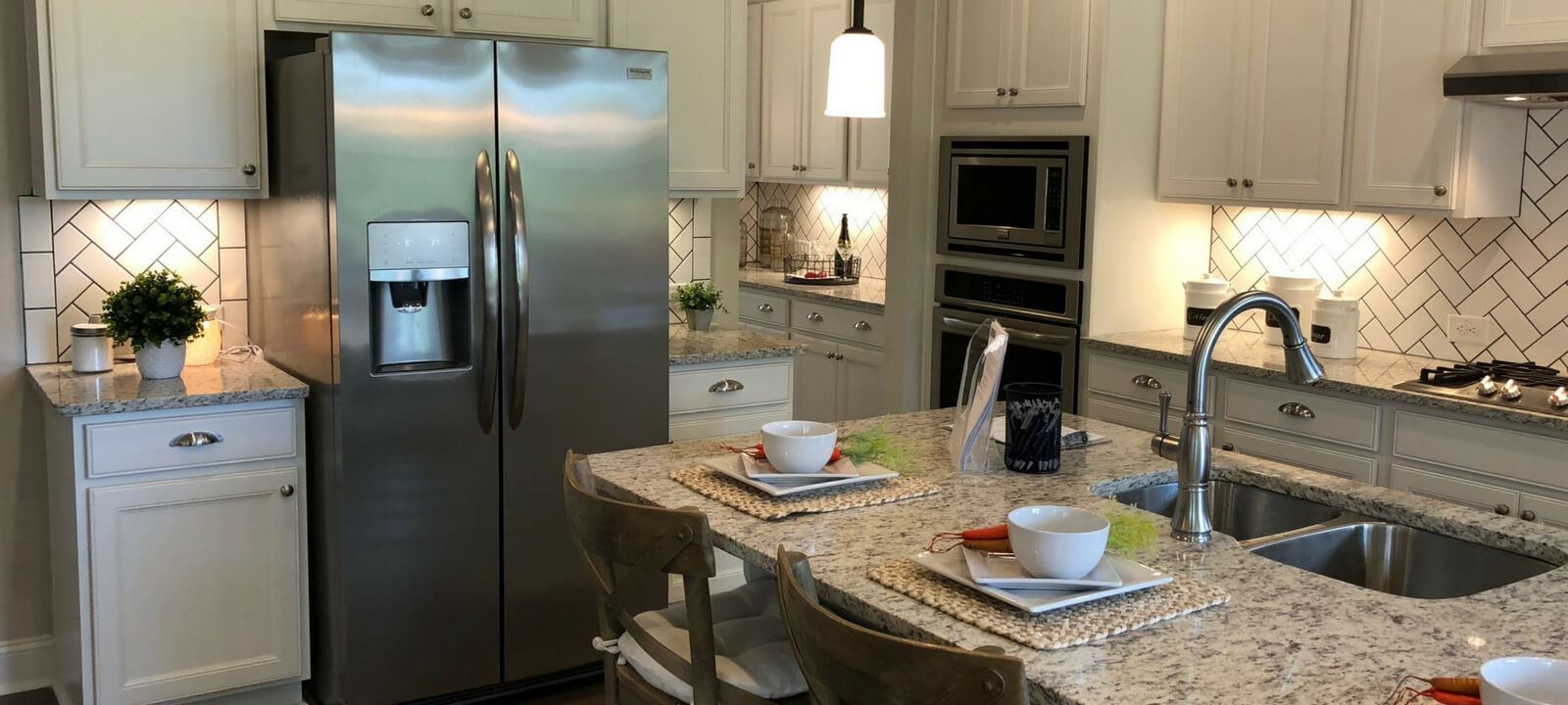 Kitchen of Fairchild model home by Vanderbilt Homes in Sterling on the Lake.