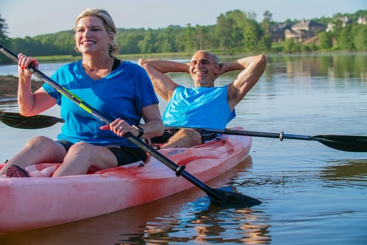 Couple kayaking at Sterling on the Lake