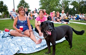 Residents hanging out enjoying a concert