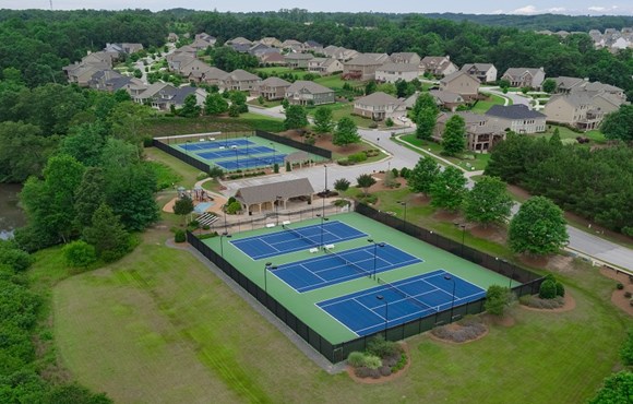 Drone view of the tennis courts at Sterling on the Lake