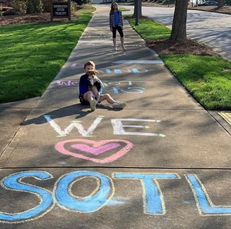 Chalk drawings in Sterling on the Lake