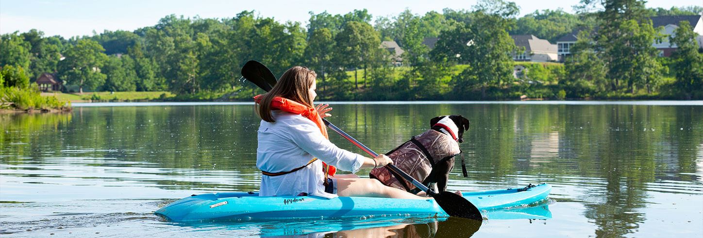 Woman kayaking on Lake Sterling.