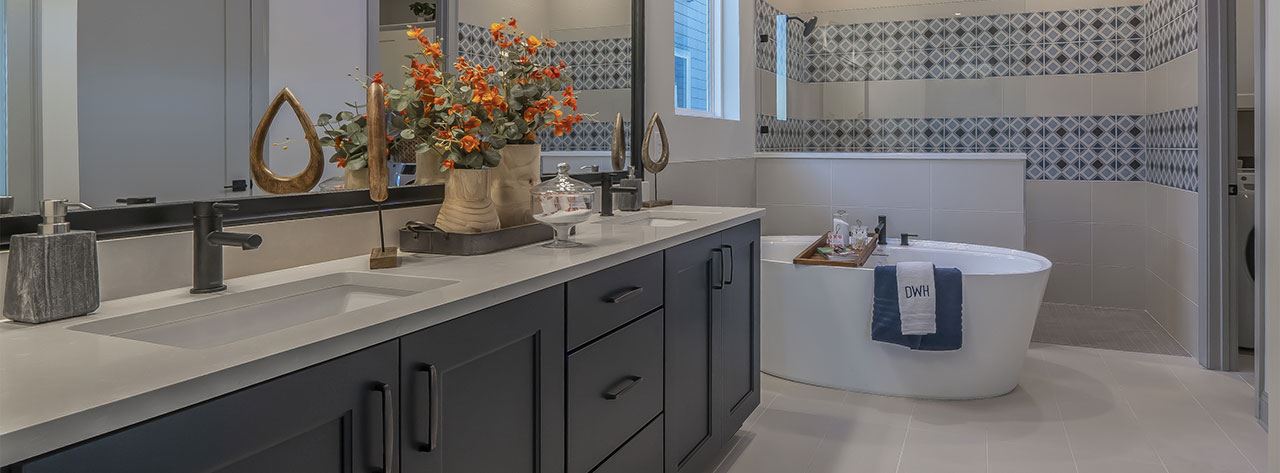 Meadowhill by David Weekley Homes model home primary bath.