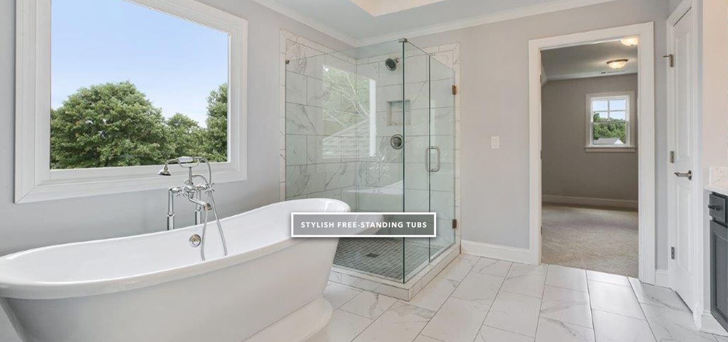 Free-standing luxury tub in primary bathroom