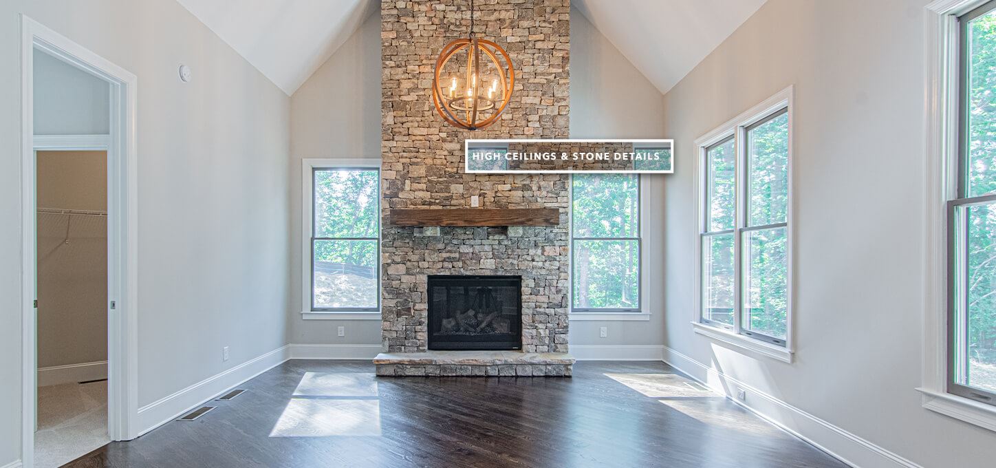 High ceilings and stone details in fireplace
